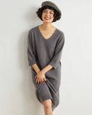 100 % cashmere half-sleeve sweater dress, relaxed A-line cut, midi length, soft camel—luxury warmth for spring brunches or layered winter office looks.