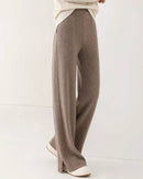 100 % wool wide-leg sweatpants, drawstring waist, ribbed cuffs, heather taupe—cloud-soft warmth for winter lounging or city outings.