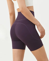 Women's Waisted butt-lifting yoga shorts featuring a soft-bounce nylon blend, 11cm sculpting waistband, and anatomical cut for breathable comfort during outdoor training.