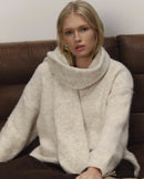  Women’s soft loose V-neck knitted pullover with built-in scarf panel and dropped shoulders—effortless winter statement for coffee runs, weekend cabin escapes or layered street looks.