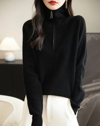 A merino wool quarter-zip sweater with quarter-zip neckline, stand collar and regular fit, designed for a cozy winter layering look that pairs from sneakers to boots.