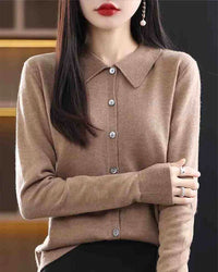 Woman layering the Basic Wool Shirt Cardigan, 100 % superfine Merino and shirt-style lapels give nautical polish—your wind-proof 45-65 °F fall-through-spring essential.