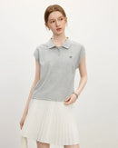 Woman strolling in a sand-beige breathable linen-blend tee, 52 % linen / 48 % TENCEL™ weave keeps you cool and dry—perfect lightweight staple for 70-85 °F summer days.