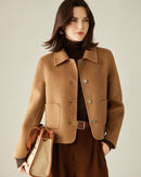Women’s camel-hair & cashmere coat in classic Chanel beige,  double-breasted four-button front, notch collar with delicate top-stitching, 80 % camel hair 20 % cashmere, soft brushed finish, office-to-evening elegance.
