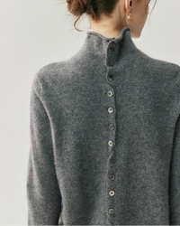 Women's cashmere reversible pullover with mock neck and front-back wear design—versatile layer for autumn offices, winter weekends or travel days.