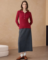 Soft-melange cashmere pullover featuring a double-fold stand collar and body-skimming fit—ideal cold-weather base for office or weekend wear.