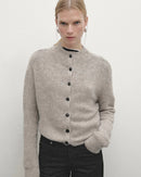 Women’s half-turtleneck cardigan with single-breasted front and slim long sleeves—sleek thermal layer for autumn offices, weekend cafés or travel-day chic.