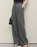 Casual versatile loose wide-leg pants for daily commuting, polyester viscose spandex blend with slight stretch, mid waist, pleated front and solid pattern design.