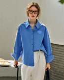 Casual pure cotton long-sleeved shirt with turn-down collar and single-breasted closure, lightweight breathable fabric perfect for spring and autumn everyday wear.