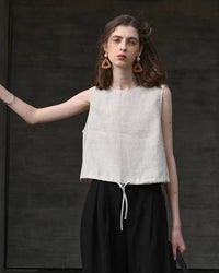 Retro women’s linen sleeveless o-neck loose crop top, casual fashion summer streetwear, perfect for office ladies and daily casual outings.