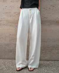 Women's vintage linen high-waist wide-leg trousers with flowing straight silhouette—polished staple for summer offices, street strolls or seaside dinners.