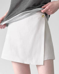 Women's linen skirt-style shorts – high-waisted loose fit, button fly closure, tatted weaving craft, perfect for casual summer outings and everyday versatile styling.