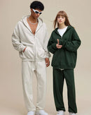  Woman layering a sand-beige casual zip-up cotton hoodie, 65 % cotton / 35 % polyester fleece keeps you cozy at 60-75 °F—perfect spring-fall commuter layer.