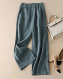 Woman brunching in Cotton-Linen Blended Wide-Leg Trousers, airy 55 % linen / 45 % cotton weave keeps you cool—your breathable 70-85 °F summer staple 