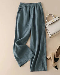 Woman brunching in Cotton-Linen Blended Wide-Leg Trousers, airy 55 % linen / 45 % cotton weave keeps you cool—your breathable 70-85 °F summer staple 