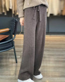 Wool blended wide-leg pants, drawstring high waist, ankle-skimming length, heather taupe—cloud-soft warmth for winter lounging or city outings.
