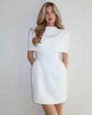 Women’s solid shawl-style mini dress with square neckline and waist-cinching silhouette—elegant statement piece for vacation parties, rooftop cocktails or summer weddings.
