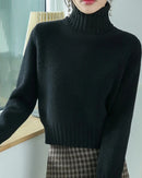 Minimal in form yet rich in texture, this turtleneck knit offers a sleek approach to cold weather dressing. 