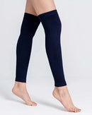A pair of knit cotton blend leg warmers with a 3D stretch wrap, designed for a secure fit that stays put under boots and skirts all day.
