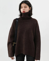 Oversized Half-turtleneck mohair knit sweater for women with a relaxed, Korean-inspired silhouette. This heavyweight warm pullover features ribbed cuffs and hem, providing plush comfort and effortless style for autumn and winter layering.