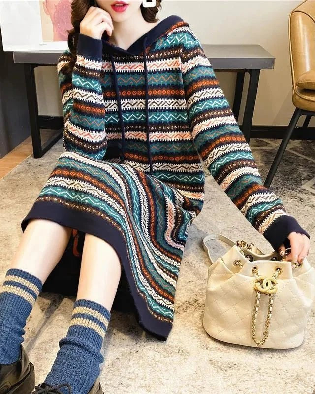 Designed for those who move through the day with ease, this striped knit hooded dress offers a relaxed fit that feels as good as it looks.