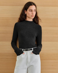 This seamless superfine wool mock neck delivers understated elegance with cloud-soft comfort. Your go-to neutral layer for seamless transitions from desk to dinner.