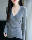 Women's irregular crossover V-neck wool pullover sweater in slim fit with high stretch fabric, perfect for elegant fall and winter layering.