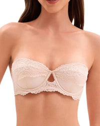 Woman lounging in the Lace Half-Cup Breathable Seamless Bra, feather-light 90 % nylon / 10 % elastane lace and wireless ¾-cup give invisible lift—your breathable 70-85 °F summer-to-fall essential that vanishes under backless tops 