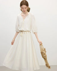 Woman brunching in a pastel lantern-sleeves V-neck strappy dress, airy 100 % rayon flows with every step—your feminine statement for 70-85 °F spring-summer days.