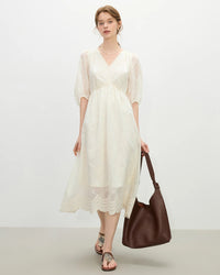 Women's white tulle lace dress - lightweight fitted design, V-neck and mid-calf length, lyocell-polyester blend with slight stretch for elegant events.