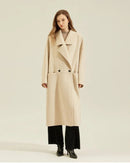 Soft cashmere long coat in oatmeal camel, hand-finished edges and single-button closure deliver quiet luxury without bulk for daily commutes.