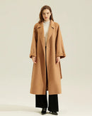Vibrant long coat, 90 % wool-cashmere blend, relaxed notch-lapel  give effortless movement without bulk for city commutes.