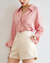 Women's elegant loose-fitting collared shirt in lightweight microfiber, featuring a classic turn-down collar and long sleeves — perfect for effortless office sophistication or casual weekend styling.