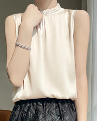 Women’s silk sleeveless tee with frill collar and loose satin drape—breezy summer top for rooftop cocktails, beach walks or air-conditioned offices .
