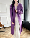 Women's merino-wool long cardigan with loose coat silhouette—elegant layer for spring offices, autumn weekends or winter travel days.