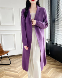 Women's merino-wool long cardigan with loose coat silhouette—elegant layer for spring offices, autumn weekends or winter travel days.