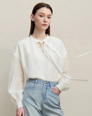Women's polka dot loose chiffon shirt, O-neck silhouette with delicate lace-up trim, tatting weaving technique, non-stretch lyocell nylon polyester material, breathable everyday top perfect for casual daily looks and light outdoor occasions.