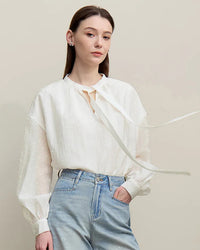 Women's polka dot loose chiffon shirt, O-neck silhouette with delicate lace-up trim, tatting weaving technique, non-stretch lyocell nylon polyester material, breathable everyday top perfect for casual daily looks and light outdoor occasions.