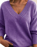 Close-up of ribbed v-neckline and chunky knit fabric, breathable pullover ideal for autumn-to-winter transitions .