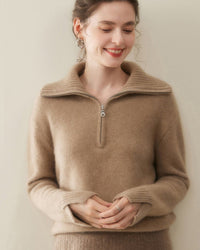 Woman sipping coffee in latte cashmere v-neck pullover, tightly knitted 2-ply Mongolian fibers drape softly for breathable winter warmth .
