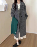 Flat-lay of slate-gray maxi overcoat, reversible brushed wool offers two clean finishes—belt it for cinched elegance or wear open for relaxed polish.