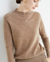 The fine-gauge knit drapes smoothly over the body, retaining warmth while remaining breathable.