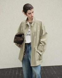 Women’s elegant light green loose coat - new embroidered design, stand-up collar, wide-waisted fit, crafted from soft lyocell cotton blend with standard thickness, zipper closure, perfect for transitional spring and autumn days or layered winter styling with dresses, sweaters, and jeans.