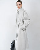 Women's new retro stand-up collar trench coat in cream cotton with single-breasted closure, featuring wide-waisted silhouette perfect for spring fall layering.