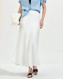 Elegant bias cut draped fishtail skirt, crafted from soft and breathable premium fabric, perfect for evening wear and minimalism, showcasing a relaxed silhouette.