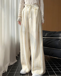 Elevate your warm-weather wardrobe with our striped drawstring wide leg pants. 