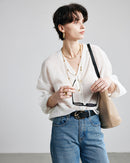 Women's ramie long-sleeve shirt featuring a solid color V-neck design and a comfortable loose fit, perfect for spring and summer fashion.