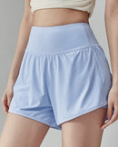 Women's High-waisted quick-drying yoga shorts featuring a nylon-elastane blend, built-in liner for coverage, and a back zip pocket, perfect for running or gym workouts.