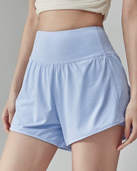 Women's High-waisted quick-drying yoga shorts featuring a nylon-elastane blend, built-in liner for coverage, and a back zip pocket, perfect for running or gym workouts.