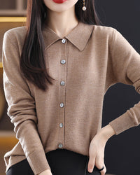 Woman layering the Basic Wool Shirt Cardigan, superfine Merino and shirt-style lapels give nautical polish—your wind-proof 45-65 °F fall-through-spring essential.